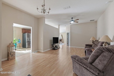 living area and kitchen entry