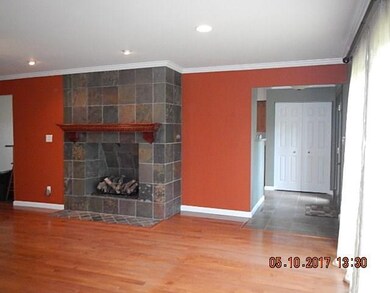 LARGE LIVING ROOM WITH HARDWOOD FLOORS AND BEAUTIF