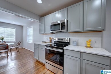 New stove and above range microwave along with a s