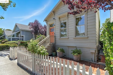 View of front of house with a fenced front yard and crawl space