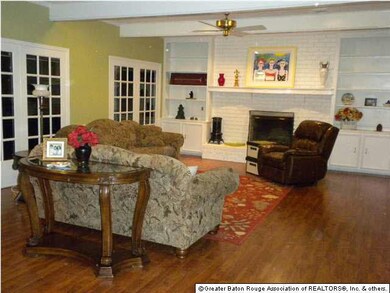 Living Room has a Wonderful Wood Burning Fireplace