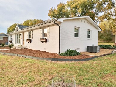 Landscaped with Pea Gravel all around the house.