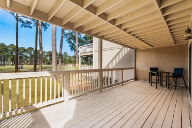 Deck featuring a lawn