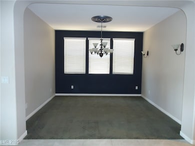 Unfurnished dining area featuring carpet flooring,