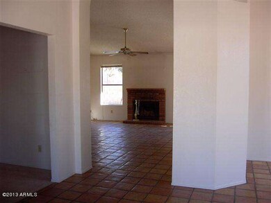 1View into Family Room with Fireplace