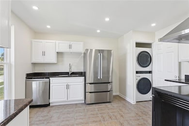 Kitchen showing Laundry Closet