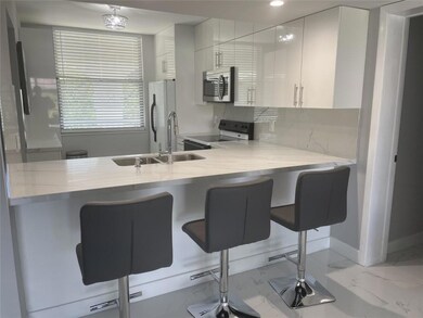 1721 Whitehall Dr unit 404, Davie, FL 33324 - photo 2