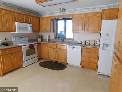 Kitchen with a large amount of cupboards. cupboard
