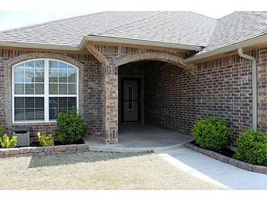 Exterior Front. Check out the tall arched entry wa