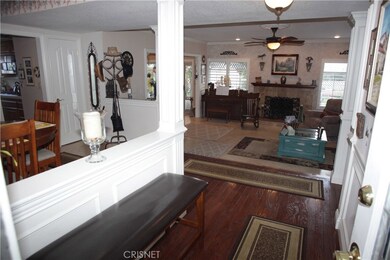Wonderful hardwood floors in this entryway that leads you into this lovely home!