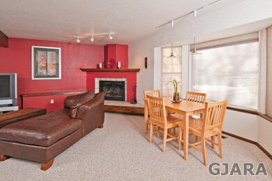 Open dining and living areas.