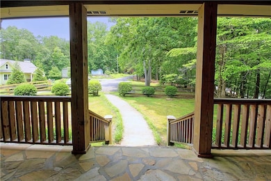 View of patio featuring view of scattered trees
