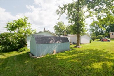 Off back deck area, fire ring & storage shed