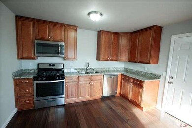 Brand new kitchen cabinetry with granite tops and 