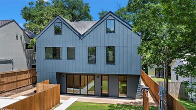 Back of property featuring board and batten sidin