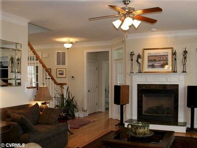 Den/Family/Great Room - Hardwood floors accented b