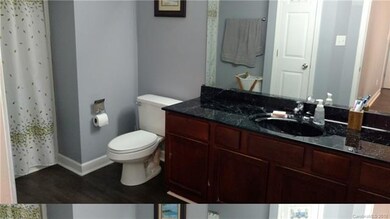 Master Bathroom with linen closet & full tub / sho