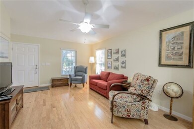 Living Room with Front Door to Front Porch.