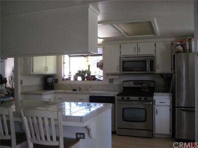 Another view of the kitchen. Extra counter space a