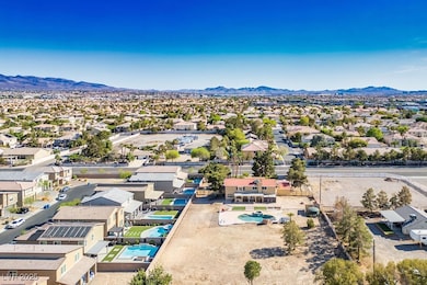 Drone / aerial view featuring a mountain view and a residential view