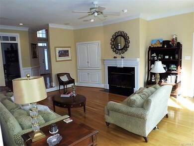 A built in T.V. cabinet; gas fireplace with detail