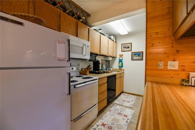 Kitchen with white appliances