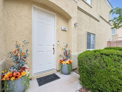 Doorway to property with stucco siding