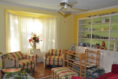 Living area featuring hardwood / wood-style floors