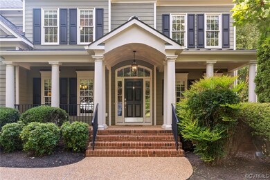 Doorway to property featuring a porch
