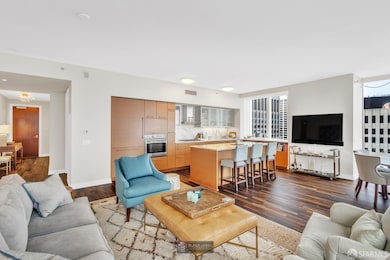 Comfort meets conversation in this light-filled living space—thoughtfully arranged for entertaining or everyday elegance.