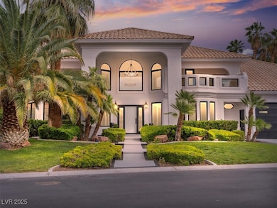 Mediterranean / spanish-style home with a tile roo