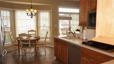 Kitchen - Ceramic tile flooring, informal dining a
