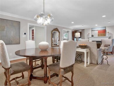 Open-concept Living and Dining rooms make for easy