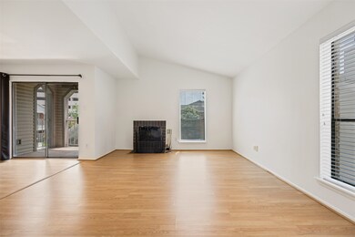 This bright, open living space features light wood
