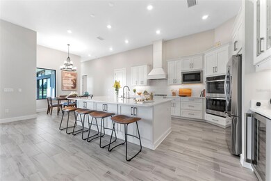 Breakfast Nook, Double Wall Oven, Oversized Island, Wine Bar & More!