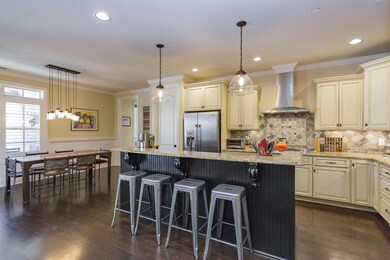 Nice, Open, Eat-In Kitchen Area featuring Granite Counter & Stainless Appliances. Open to Great Room.