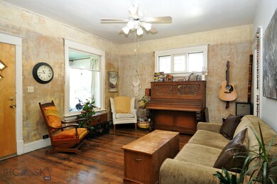 Upstairs living room with original fir flooring an
