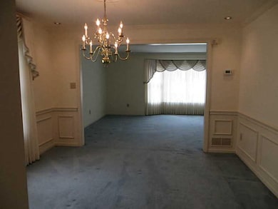 Dining Room. Dining room w/crown molding, chandeli