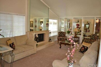 Living room has a custom gas fireplace and more