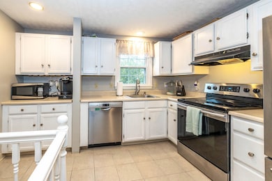 50 Edward J Roy Dr unit 50, Manchester, NH 03104 - photo 2