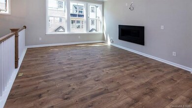 The modern fireplace adds the perfect amount of ch