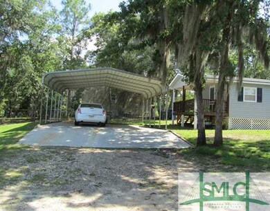Other. EXTERIOR REAR CARPORT AND BACK PORCH
