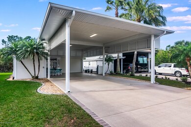 212 Coach Club Dr, Titusville, FL 32780 - photo 2