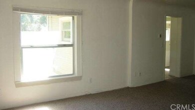 Living room -door leading to kitchen