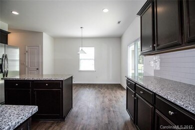 Kitchen looking into Breakfast area