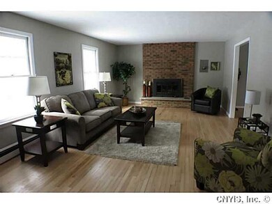 Living Room Stay warm by the fireplace, there are 