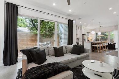 Living room with plenty of natural light, concret