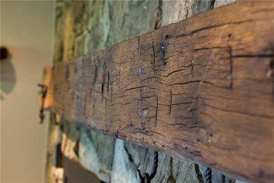 Beams complement the living areas ceilings and acc