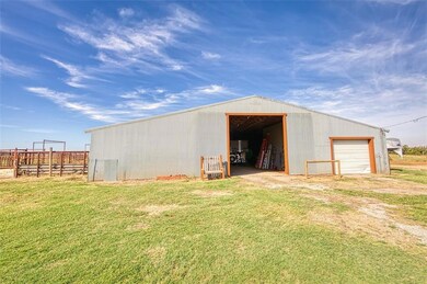 60x60 Barn.  Garage door opens into workshop area.
