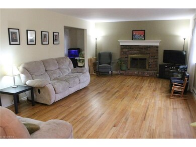 The 14x24 Living Room boasts original hardwood and